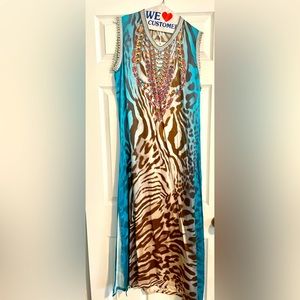 Women’s caftan- blue silk with leopard pattern and beaded detail on front